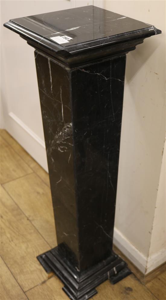 A black marble pedestal, H.3ft 1in.